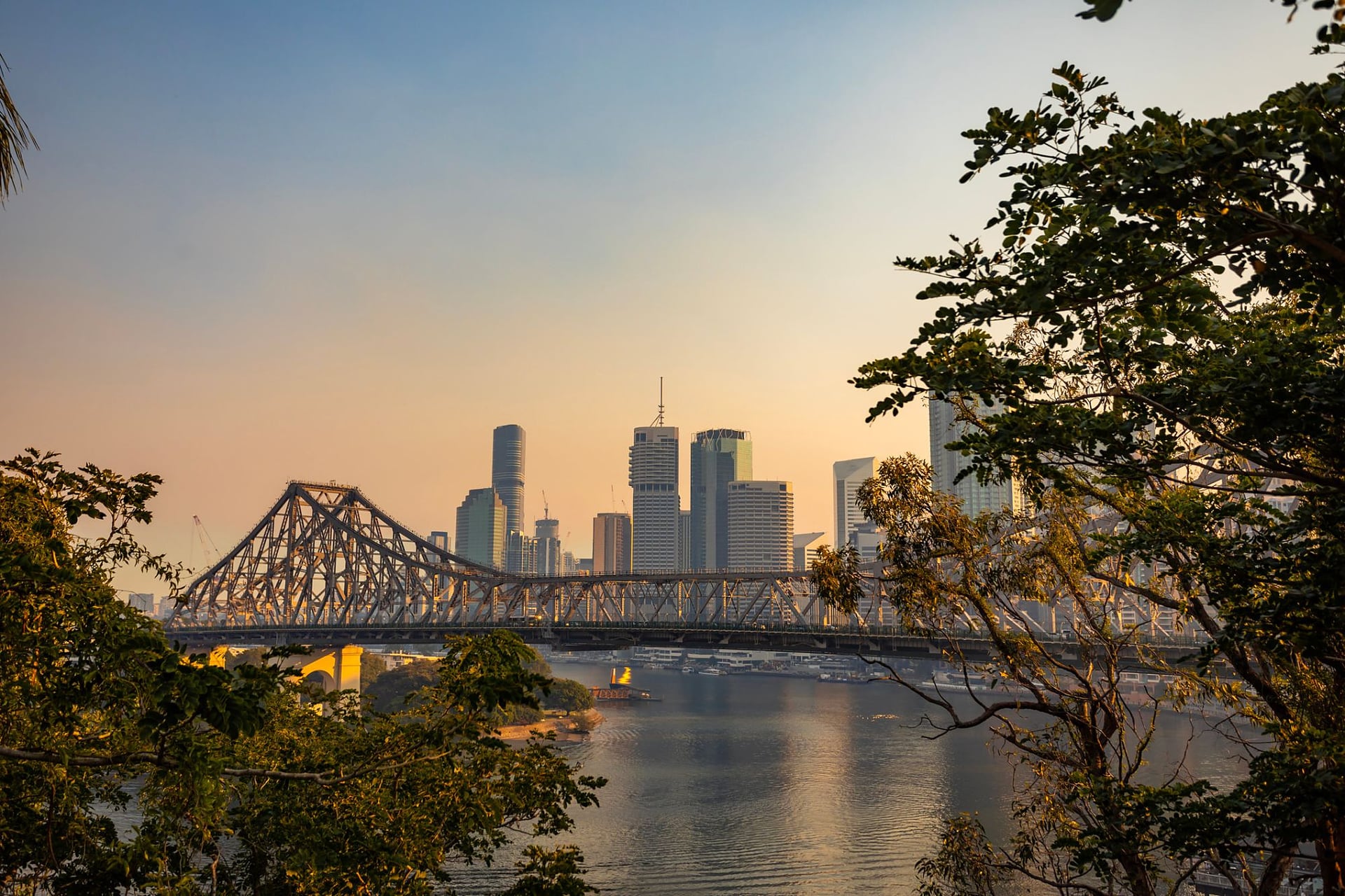 The Story Bridge and Brisbane skyline at sunset