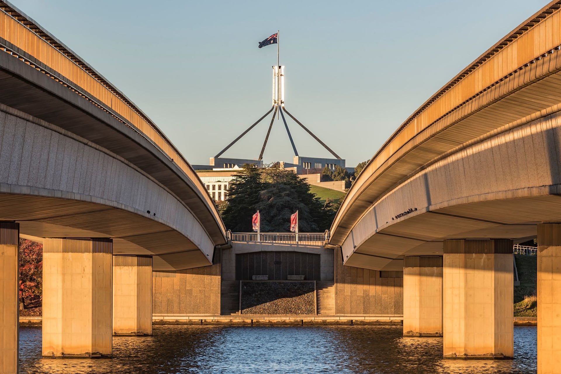 Parliament House flagpole seen between Commonwealth Avenue bridges, Canberra