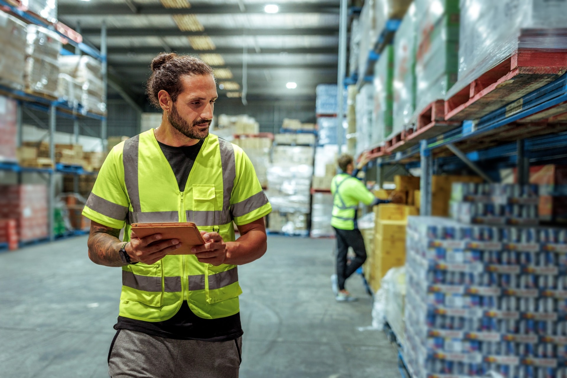Warehouse supervisor checking stock with a tablet, Dandenong South VIC