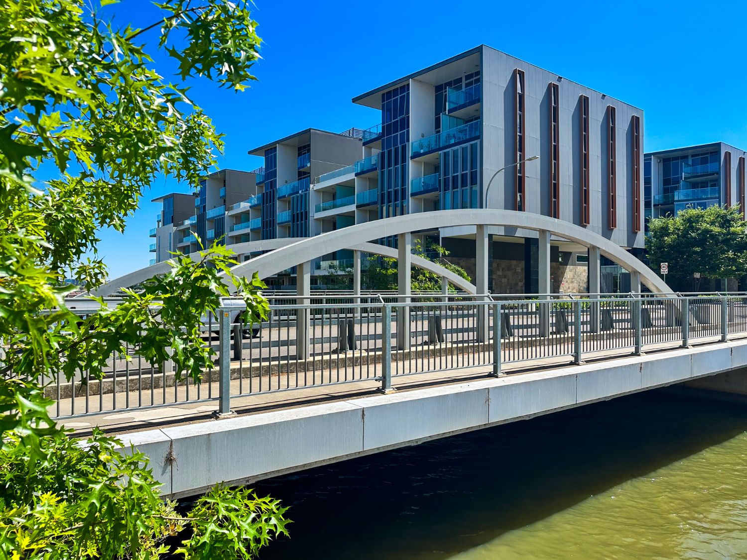 Modern apartment building beside a bridge, Canberra ACT
